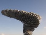 This futuristic sculpture sings when the wind blows and looks like the wreckage of an Alien space craft